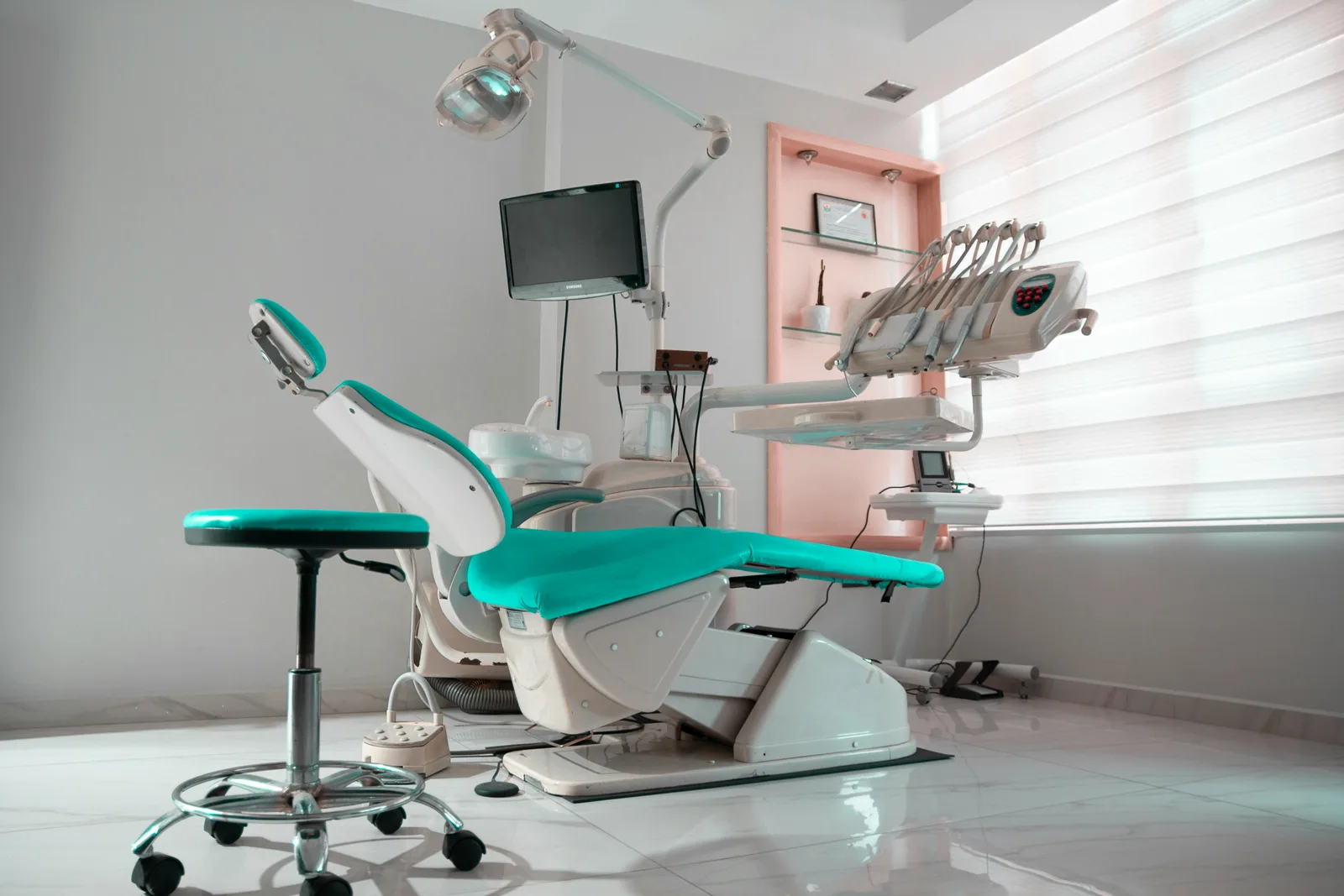 Modern dental practice operatory showing the business complexity dentists manage daily